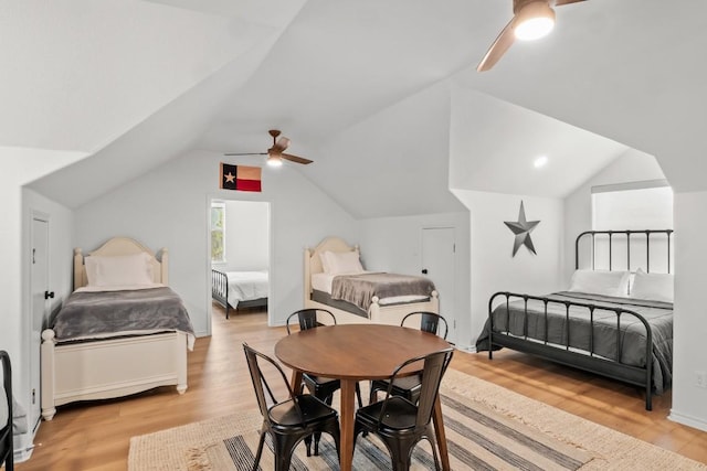 18113 Travis Dr, Lago Vista, TX 78645 - bedroom featuring light wood finished floors, lofted ceiling, and a ceiling fan