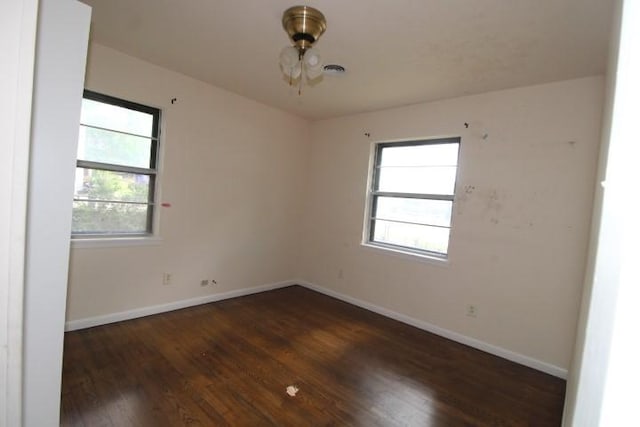 313 Elm St, Copperas Cove, TX 76522 - empty room with wood finished floors and baseboards