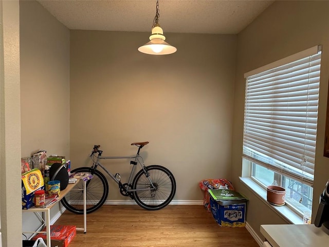 2414 Longview St Unit 301, Austin, TX 78705 - game room featuring wood finished floors and a textured ceiling