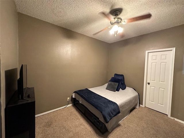 2414 Longview St Unit 301, Austin, TX 78705 - bedroom featuring carpet flooring, a textured ceiling, and ceiling fan