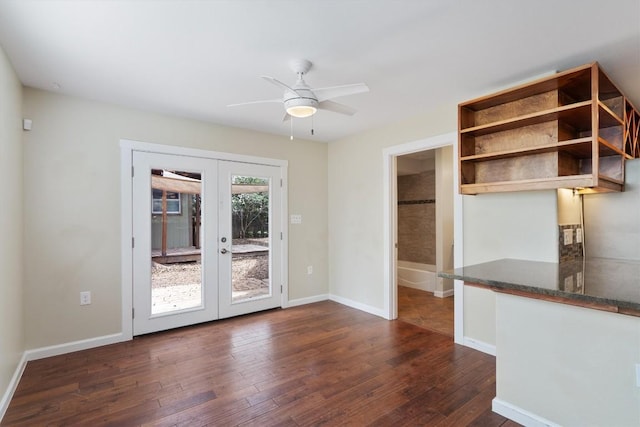 6202 Hillston Dr, Austin, TX 78745 - unfurnished dining area with french doors, dark wood finished floors, and a ceiling fan