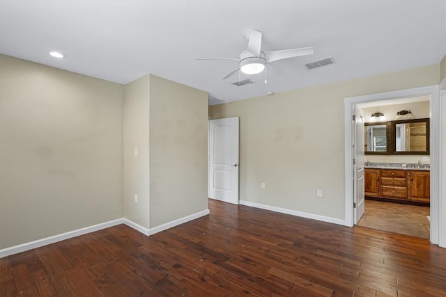 6202 Hillston Dr, Austin, TX 78745 - unfurnished bedroom featuring dark wood-type flooring, recessed lighting, ensuite bathroom, and a ceiling fan