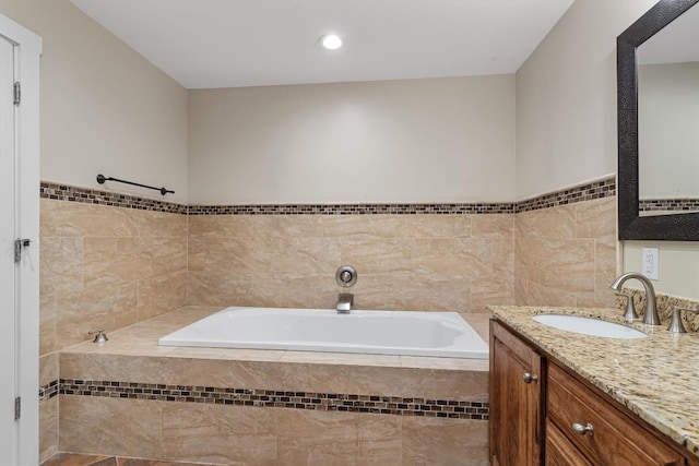 6202 Hillston Dr, Austin, TX 78745 - full bath with vanity, a bath, and recessed lighting