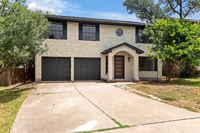 13265 Kerrville Folkway Dr, Austin, TX 78729 - view of front of home featuring stone siding, an attached garage, and concrete driveway