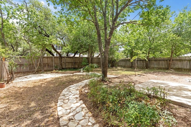 13265 Kerrville Folkway Dr, Austin, TX 78729 - fenced backyard featuring a patio area