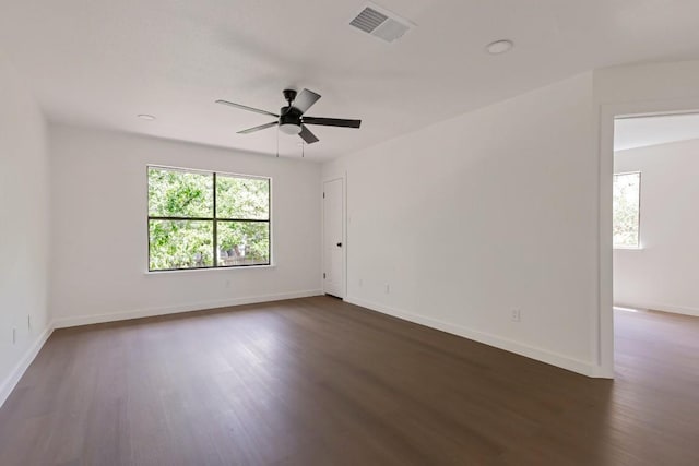 13265 Kerrville Folkway Dr, Austin, TX 78729 - empty room with dark wood finished floors and ceiling fan