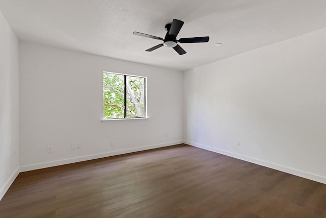 13265 Kerrville Folkway Dr, Austin, TX 78729 - unfurnished room featuring dark wood finished floors and a ceiling fan