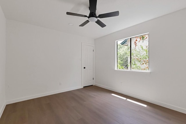 13265 Kerrville Folkway Dr, Austin, TX 78729 - unfurnished room with wood finished floors and ceiling fan