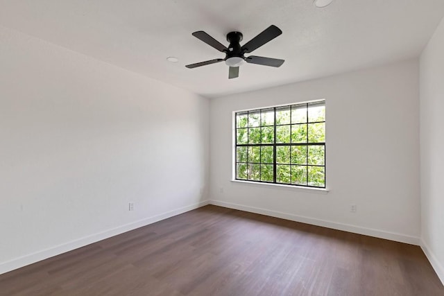 13265 Kerrville Folkway Dr, Austin, TX 78729 - spare room featuring dark wood finished floors and a ceiling fan