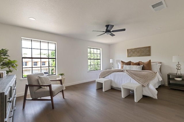 13265 Kerrville Folkway Dr, Austin, TX 78729 - bedroom with wood finished floors, ceiling fan, and recessed lighting