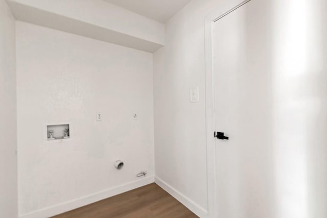 13265 Kerrville Folkway Dr, Austin, TX 78729 - laundry room with hookup for a washing machine and wood finished floors
