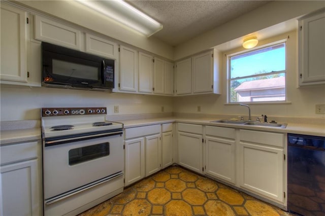 1811 Lone Oak Dr, Leander, TX 78641 - kitchen with black appliances, light countertops, and a textured ceiling