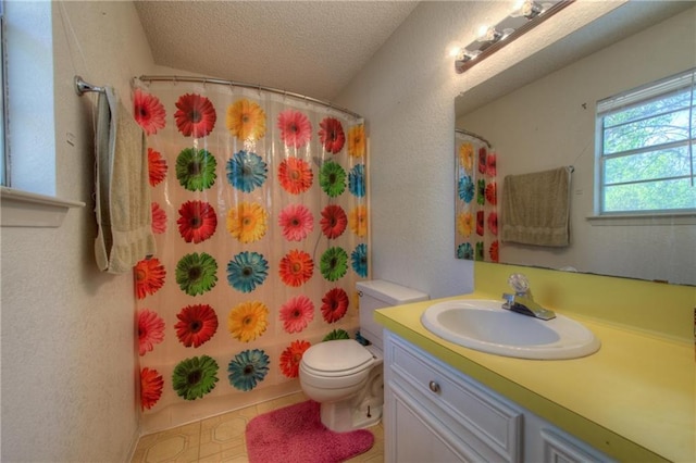 1811 Lone Oak Dr, Leander, TX 78641 - full bathroom featuring vanity, a textured ceiling, a shower with curtain, and a textured wall