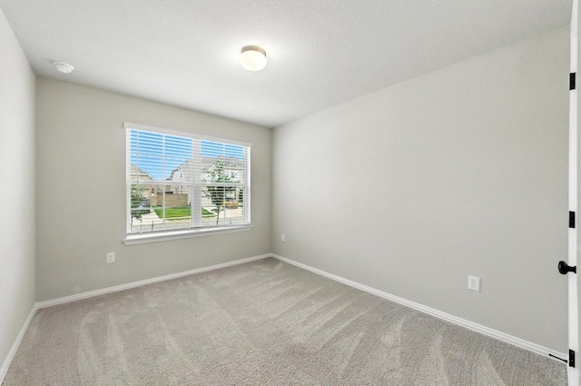 149 Hackberry Ln, Bastrop, TX 78602 - empty room with carpet and baseboards