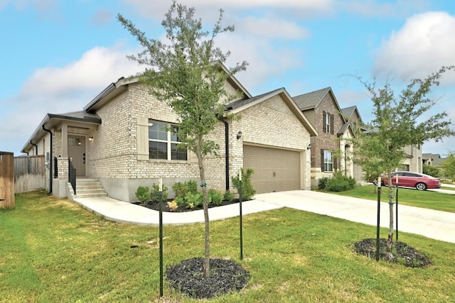 149 Hackberry Ln, Bastrop, TX 78602 - view of front of house featuring an attached garage, brick siding, and concrete driveway