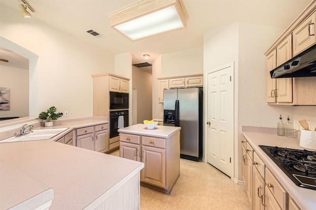 1108 Red Ranch Cir, Cedar Park, TX 78613 - kitchen featuring black appliances, light countertops, a center island, and under cabinet range hood