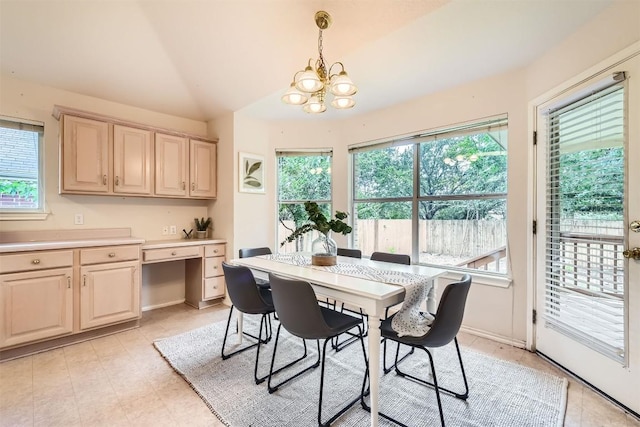 1108 Red Ranch Cir, Cedar Park, TX 78613 - dining room with lofted ceiling and a chandelier