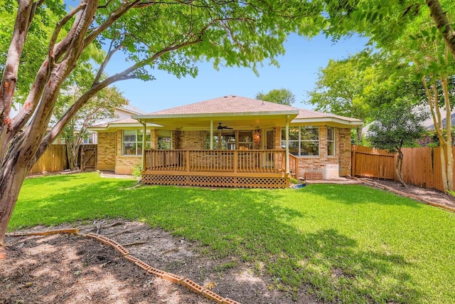1108 Red Ranch Cir, Cedar Park, TX 78613 - back of property featuring brick siding, a fenced backyard, a ceiling fan, and a wooden deck