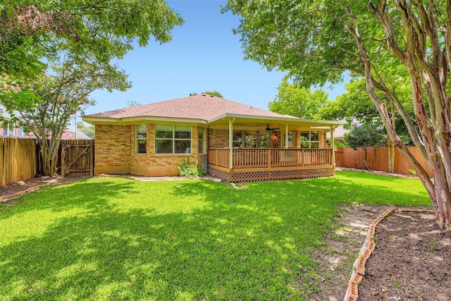 1108 Red Ranch Cir, Cedar Park, TX 78613 - back of house with a fenced backyard, a wooden deck, brick siding, and a ceiling fan