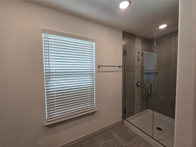 2105 Tiger Trl Unit 702, Round Rock, TX 78664 - full bathroom featuring a stall shower, recessed lighting, and tile patterned floors