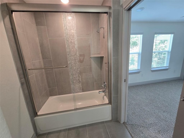 2105 Tiger Trl Unit 702, Round Rock, TX 78664 - full bathroom with combined bath / shower with glass door and tile patterned flooring