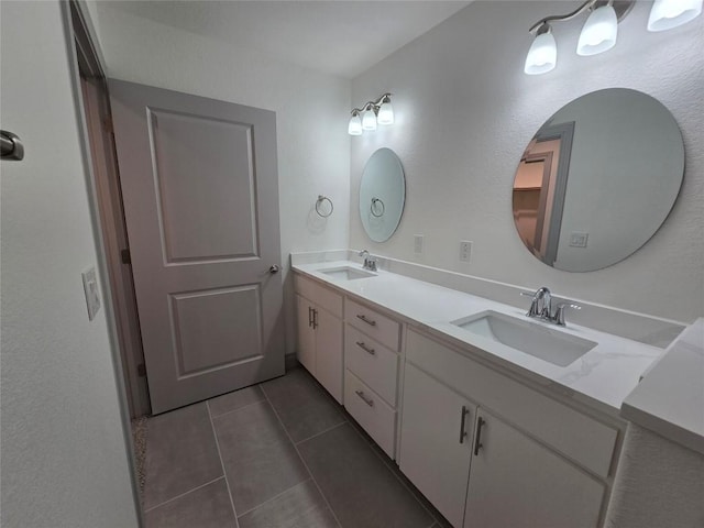 2105 Tiger Trl Unit 702, Round Rock, TX 78664 - full bathroom featuring double vanity and tile patterned floors