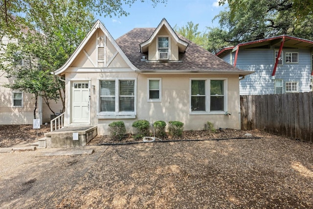 1110 W 22nd St Unit 1, Austin, TX 78705 - view of front of home with stucco siding and a shingled roof