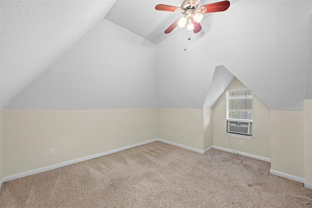 1110 W 22nd St Unit 1, Austin, TX 78705 - additional living space featuring cooling unit, lofted ceiling, ceiling fan, carpet, and a textured ceiling