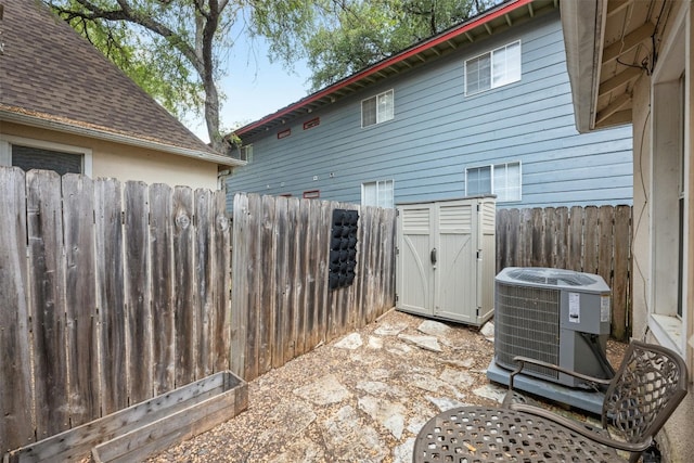 1110 W 22nd St Unit 1, Austin, TX 78705 - view of patio / terrace with a storage unit