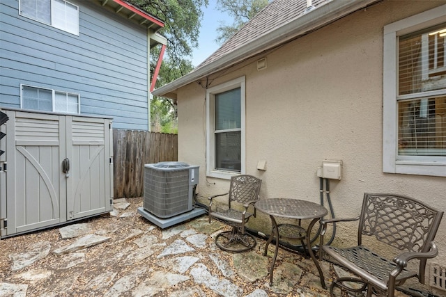 1110 W 22nd St Unit 1, Austin, TX 78705 - view of patio with a shed