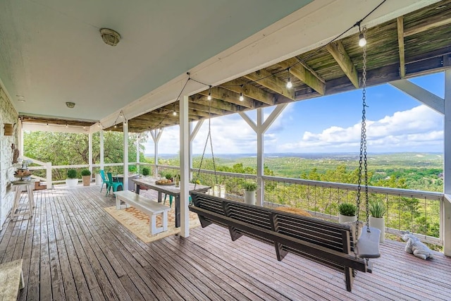 8132 Breeze Way, Jonestown, TX 78645 - wooden terrace with outdoor lounge area