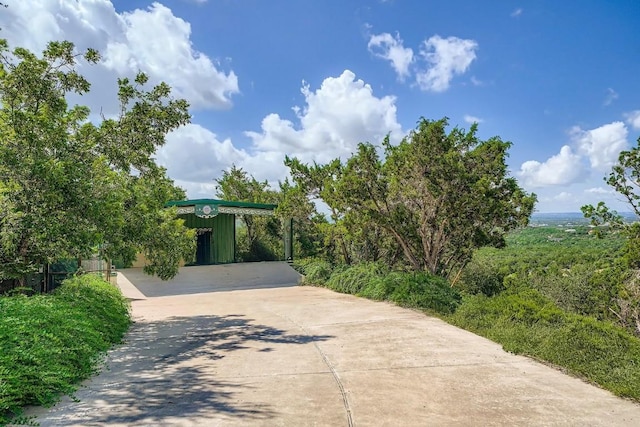 8132 Breeze Way, Jonestown, TX 78645 - view of front of house with driveway