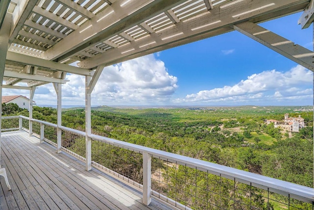 8132 Breeze Way, Jonestown, TX 78645 - wooden deck featuring a wooded view and a pergola