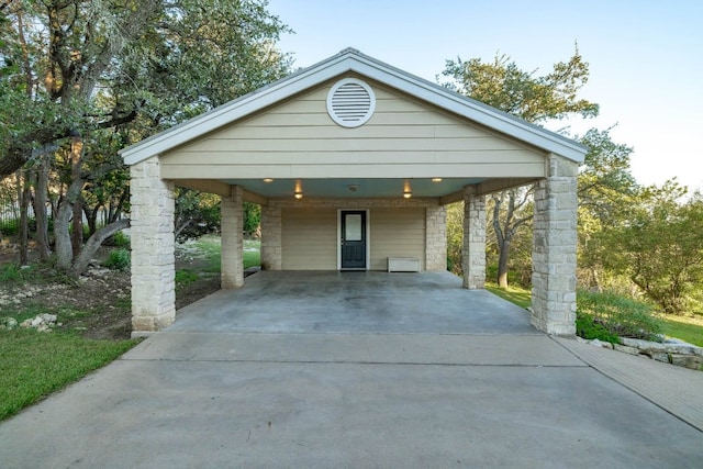 8132 Breeze Way, Jonestown, TX 78645 - view of front facade with driveway and a carport