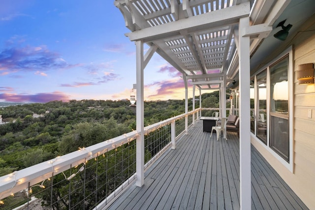8132 Breeze Way, Jonestown, TX 78645 - deck at dusk with a pergola