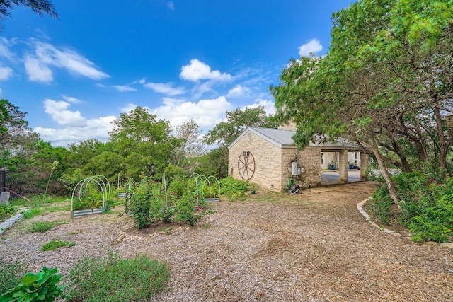 8132 Breeze Way, Jonestown, TX 78645 - view of yard with a garden