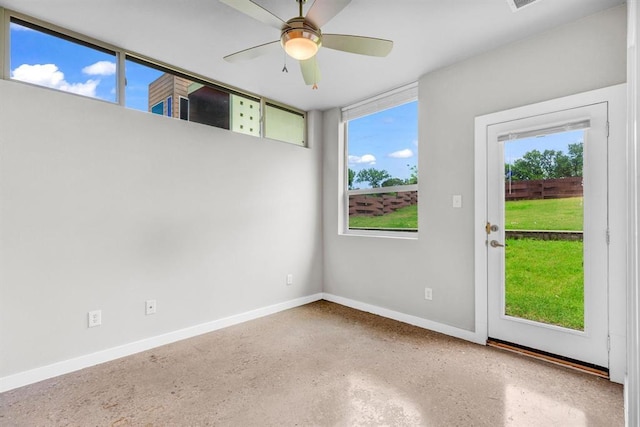 5325 Sendero Hills Pkwy, Austin, TX 78724 - empty room with a ceiling fan and speckled floor