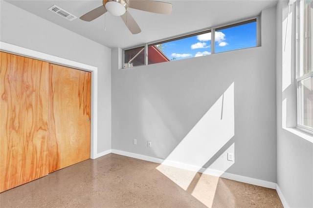 5325 Sendero Hills Pkwy, Austin, TX 78724 - spare room with a ceiling fan, plenty of natural light, and speckle patterned floor