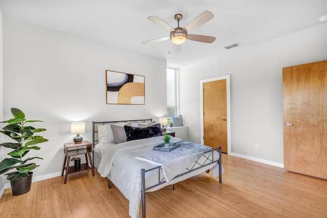 5325 Sendero Hills Pkwy, Austin, TX 78724 - bedroom with wood finished floors and a ceiling fan