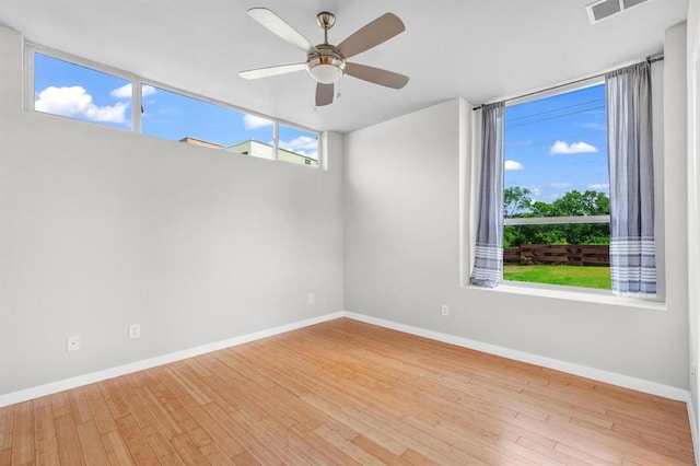 5325 Sendero Hills Pkwy, Austin, TX 78724 - spare room featuring wood finished floors and ceiling fan