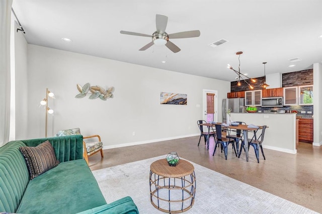 5325 Sendero Hills Pkwy, Austin, TX 78724 - living room with a ceiling fan and recessed lighting