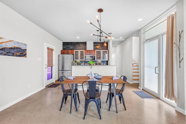 5325 Sendero Hills Pkwy, Austin, TX 78724 - dining area featuring stairs, a chandelier, and recessed lighting