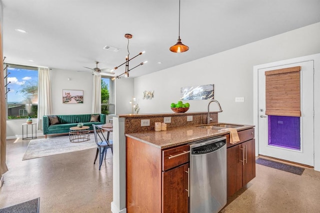 5325 Sendero Hills Pkwy, Austin, TX 78724 - kitchen featuring stainless steel dishwasher, dark aggregate flooring, a ceiling fan, and hanging light fixtures
