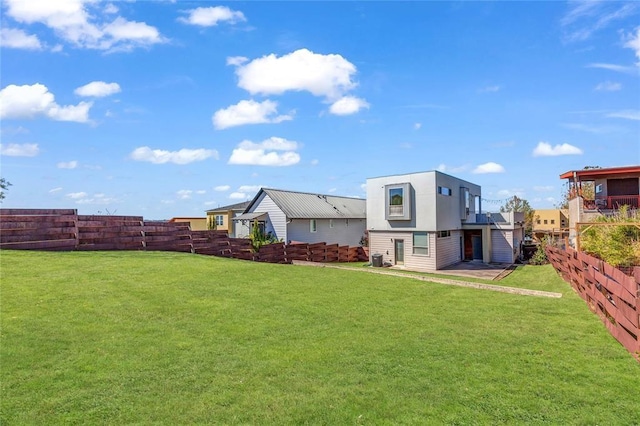 5325 Sendero Hills Pkwy, Austin, TX 78724 - rear view of property featuring a fenced backyard