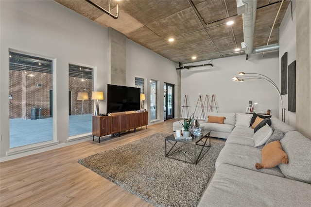 4510 Terry-O Ln Unit 126, Austin, TX 78745 - living area featuring wood finished floors and a high ceiling