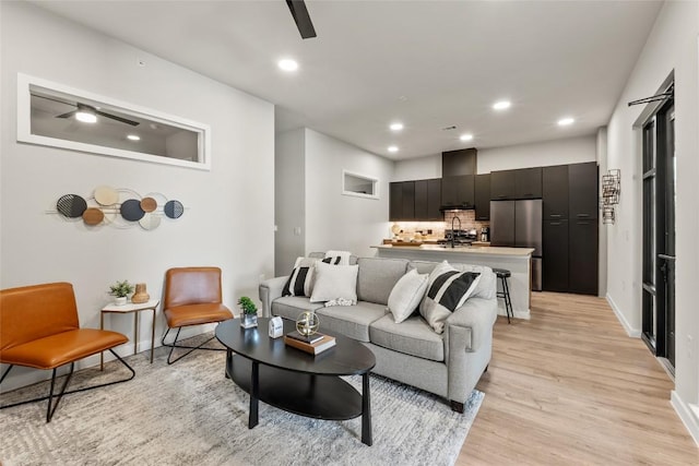 4510 Terry-O Ln Unit 126, Austin, TX 78745 - living room with ceiling fan, light wood finished floors, and recessed lighting