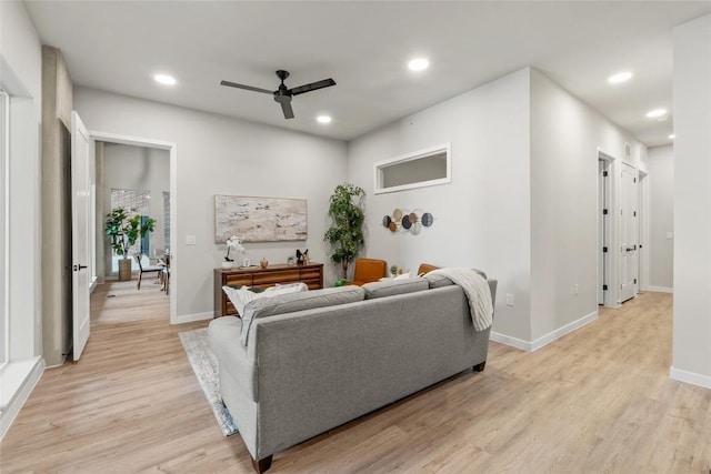 4510 Terry-O Ln Unit 126, Austin, TX 78745 - living room with ceiling fan, light wood finished floors, and recessed lighting