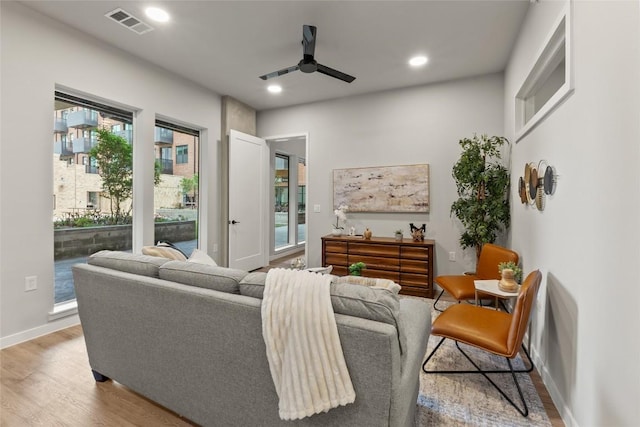 4510 Terry-O Ln Unit 126, Austin, TX 78745 - living area featuring ceiling fan, wood finished floors, and recessed lighting