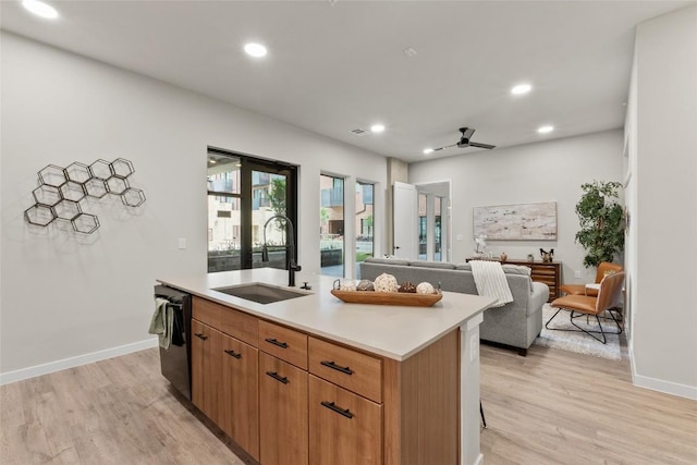 4510 Terry-O Ln Unit 126, Austin, TX 78745 - kitchen featuring black dishwasher, light wood-style flooring, ceiling fan, light countertops, and recessed lighting