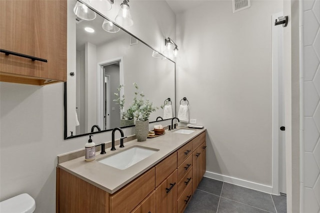4510 Terry-O Ln Unit 126, Austin, TX 78745 - bathroom with double vanity and tile patterned flooring